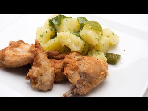 Delicioso asado de conejo con patatas y pimientos: una receta irresistible